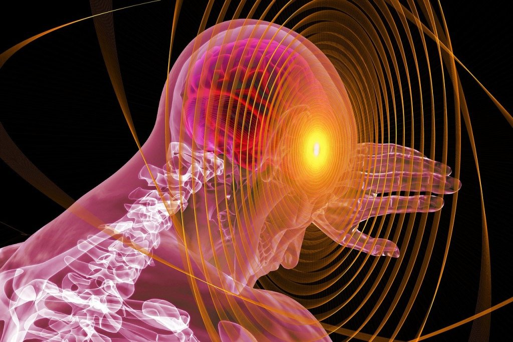 See through image of a head and shoulders. The head is facing away and holding up their hans to shield their eyes. 
A radiating yellow glow is happening in the central cortex indicating the implosion occuring due to shutdown.