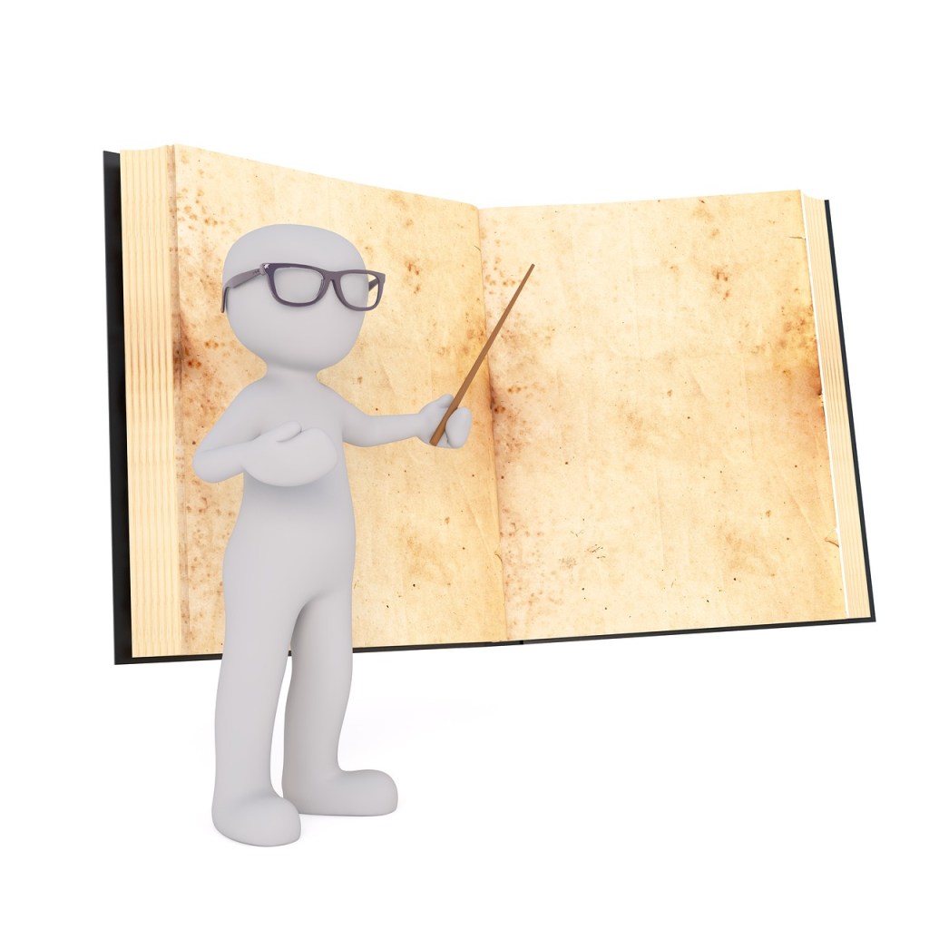 White clay figure holding a pointer pointing at a blank book